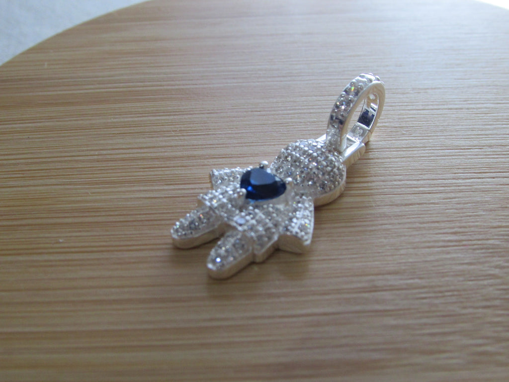 Pingente Menino Cravejado com Micro Zircônias Cristal e Coração Zircônia Azul